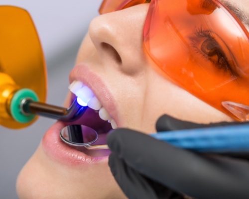 Patient receiving cosmetic dental bonding