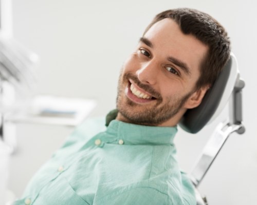 Man sharing smile after tooth extraction