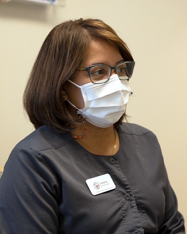 Dentist in dental treatment room