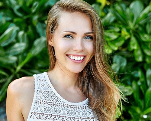 woman smiling after Invisalign in New City