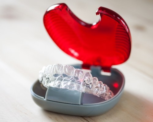 Set of Invisalign trays in carrying case